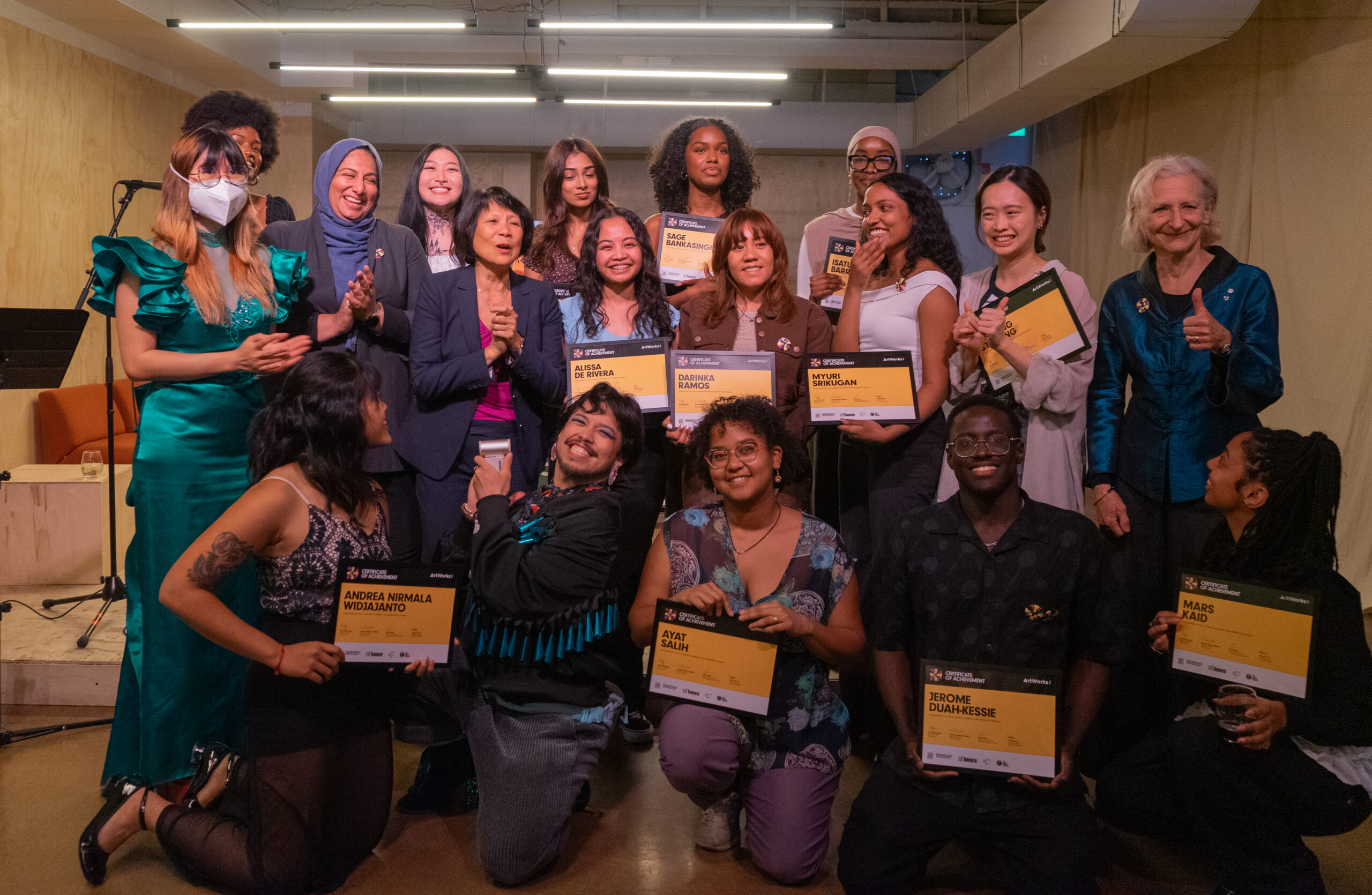 ArtWorksTO grads stand with Mayor Olivia Chow and Toronto Arts Foundation Chair Sarah Diamond.