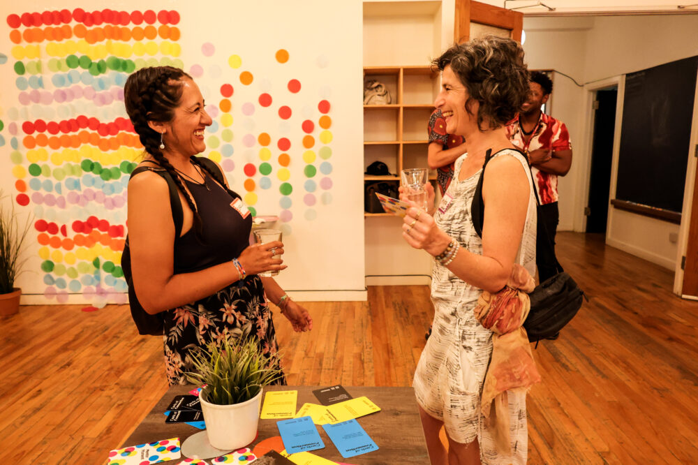 People attend a networking event.