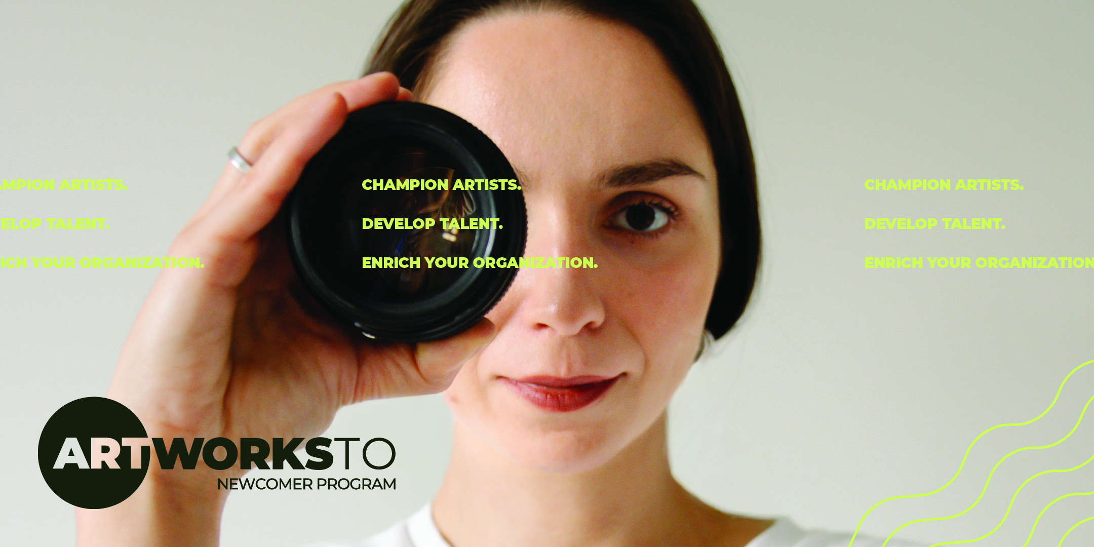 A person holds a camera lens to their face. Text reads: ArtWorksTO Newcomer Program. Champion artists. Develop talent. Enrich your organization.