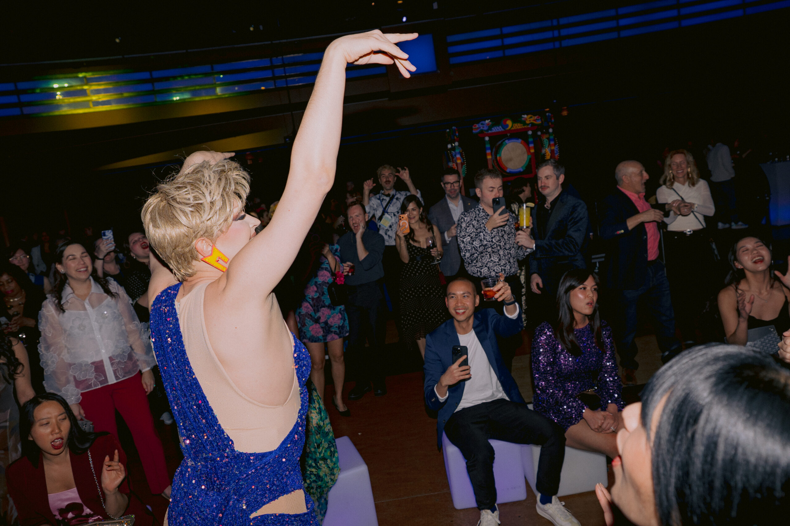 Local drag artist Miss Moco performs for a crowd.